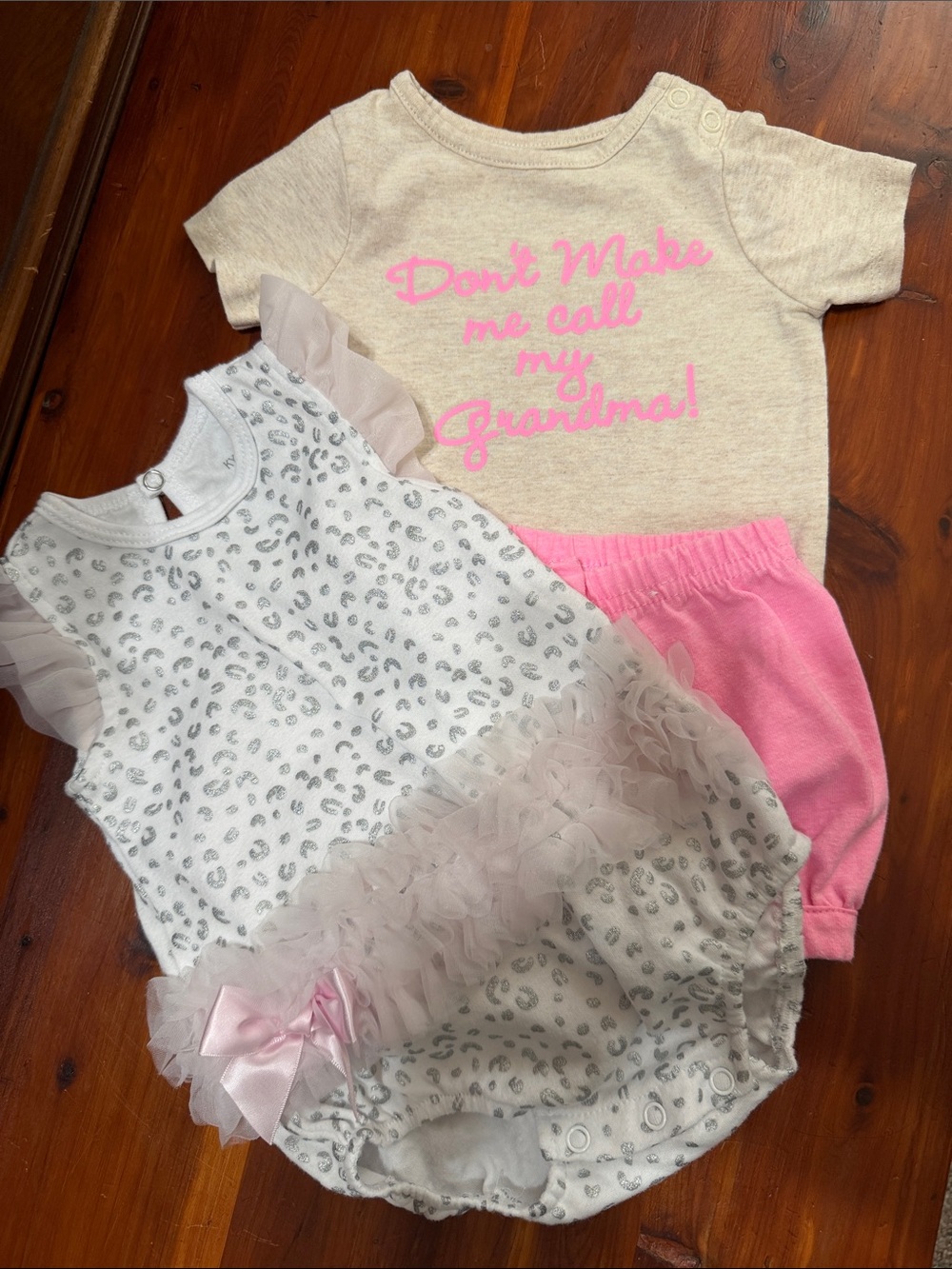 Two Baby Girls Pink Onesies / Tutu Trim with Leporad Print & Grandma Saying 6-9M